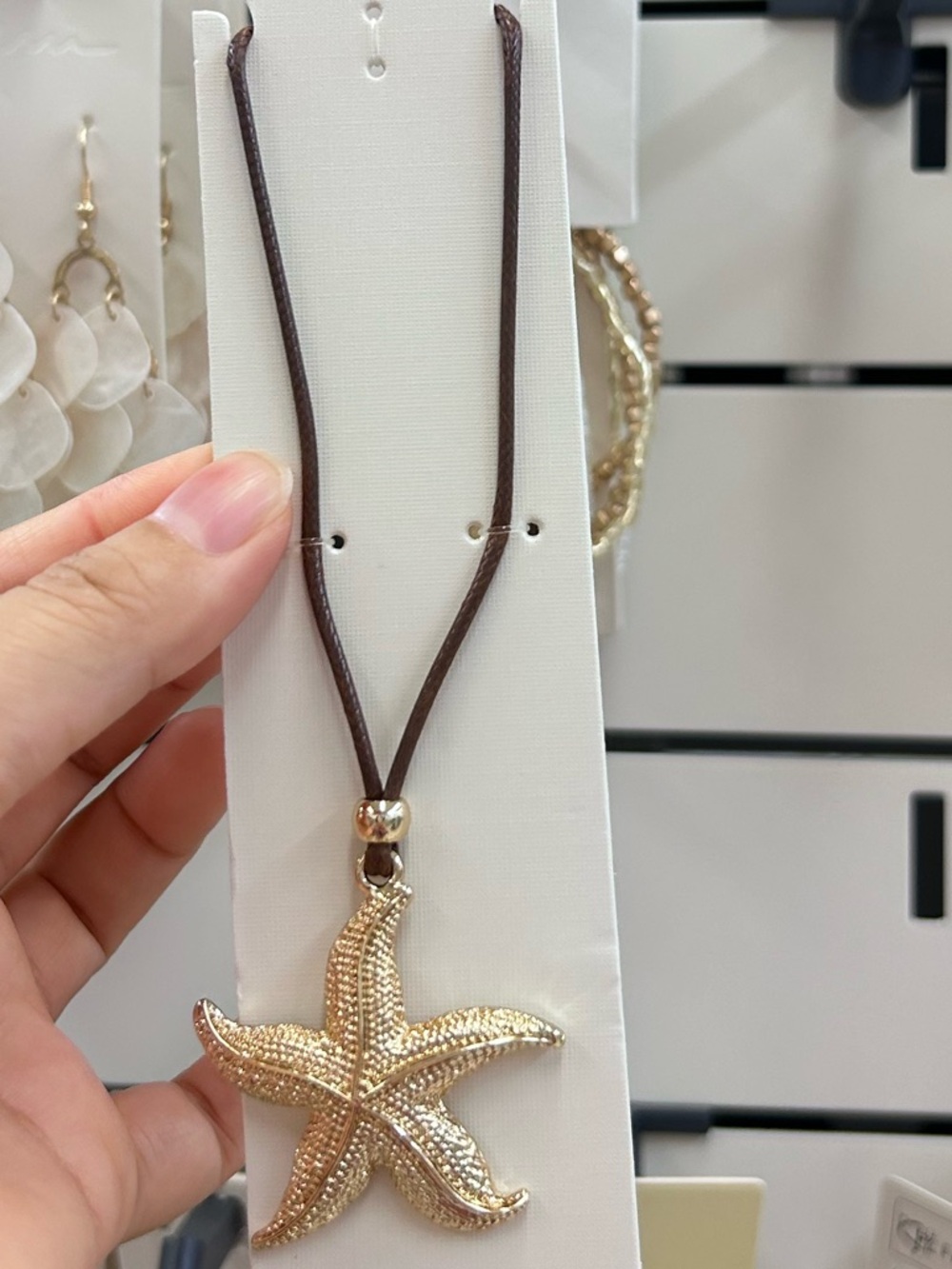 Gold Starfish Pendant Necklace - Brown Cord